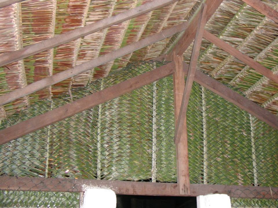 Telhado com palha de coqueiro